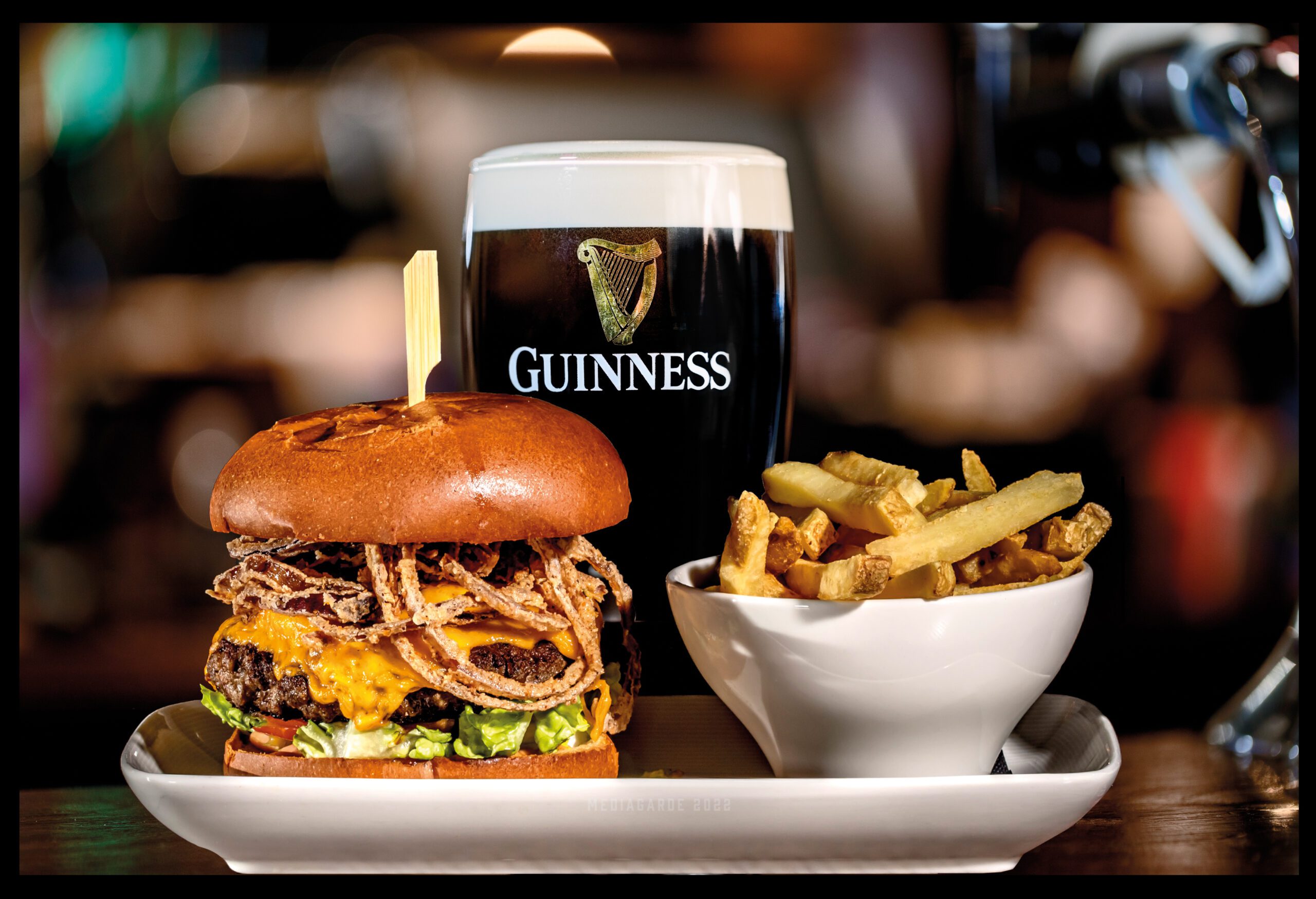 The MKI Classic beef burger with bacon, cheese and onion strings